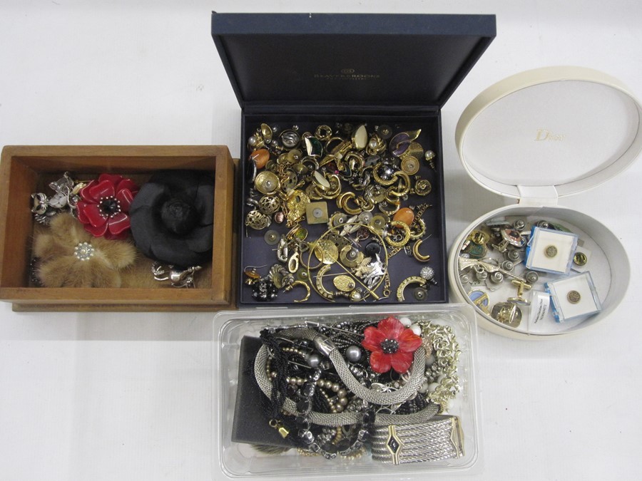 Quantity of costume jewellery to include bracelets, necklaces, cufflinks, badges, earrings, brooches