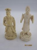 Two various antique carved ivory figures, probably chess pieces, viz:- a knight and a queen, 6cm