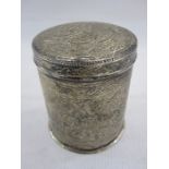 Egyptian silver jar and cover of cylindrical form decorated with scroll work and decorative