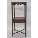 Late 19th/early 20th century mahogany washstand, the square top with recesses for washbowls, shelved