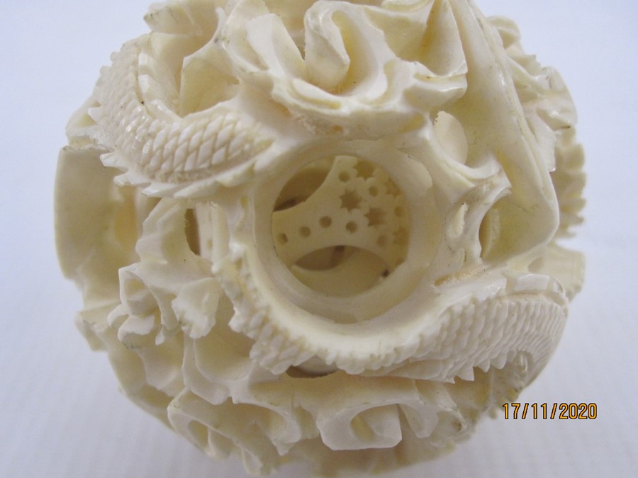 Early 20th century Chinese carved ivory puzzle ball on stand with three graduated leaf-pattern - Image 3 of 3