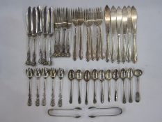 A set of four 1930s Walker and Hall tea spoons with golfing decorated handles, Sheffield 1933, 1.