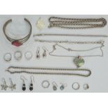 Quantity of silver chains, pendants, silver bracelet, rings and other similar jewellery (1 box)