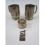 A 1930s silver christening mug, initialled 'A', London 1930, makers mark worn, 2.8toz, 8.7cm high,