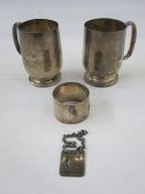 A 1930s silver christening mug, initialled 'A', London 1930, makers mark worn, 2.8toz, 8.7cm high,