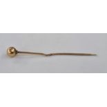 Gold-coloured metal stickpin