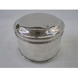 A 1920s silver lidded circular box, plain form with reeded decoration to rims, Chester 1923, maker