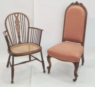 Late Victorian chair with carved top rail, upholstered seat and back, cabriole legs terminating to