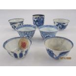 Two pairs of underglaze blue Chinese porcelain miniature tea bowls, two others and a porcelain