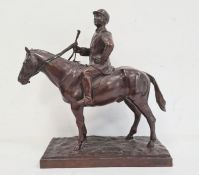 Bronze sculpture of jockey on horse, on stepped rectangular base, unattributed, stamped 'Green and