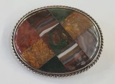Scottish silver hardstone brooch of oval form set with a chequer board of different agates within