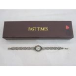 Modern lady's bracelet watch with circular mother-of-pearl dial in marcasite case and on pierced