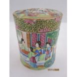 Chinese Canton porcelain tea caddy and cover, cylindrical and painted with figures in a garden, in