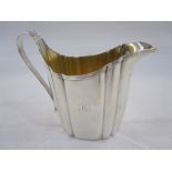 George III silver cream jug, London 1797, maker's mark rubbed, of shaped oval form with reeded