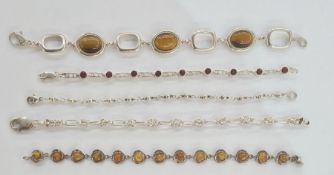 Silver and garnet set modern bracelet, a silver rectangular and knot link bracelet, a silver ball-