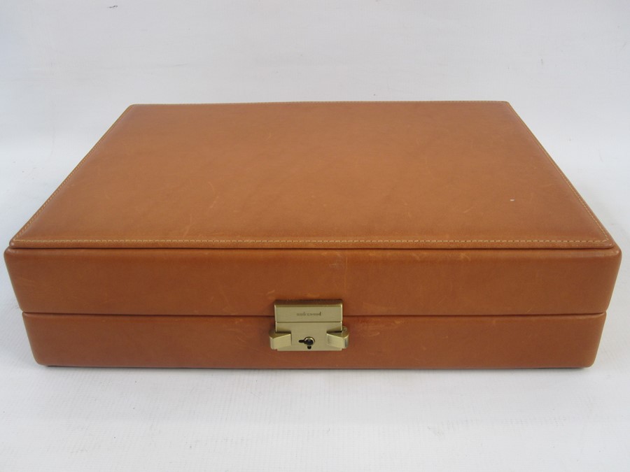 Leather watch box by Underwood of London, the fitted interior for ten watches and in green card