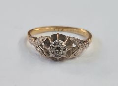 18ct gold and solitaire diamond ring, illusion set and raised with foliate shoulders