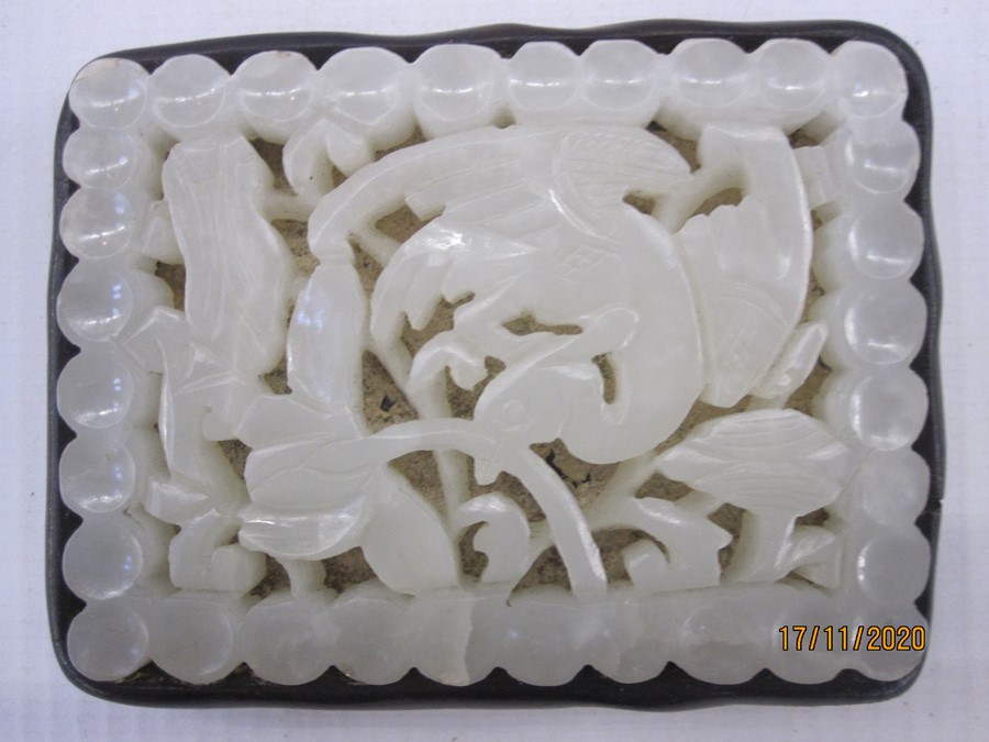 Chinese pale celadon carved jade openwork plaque, Ming dynasty, rectangular and carved with a wild