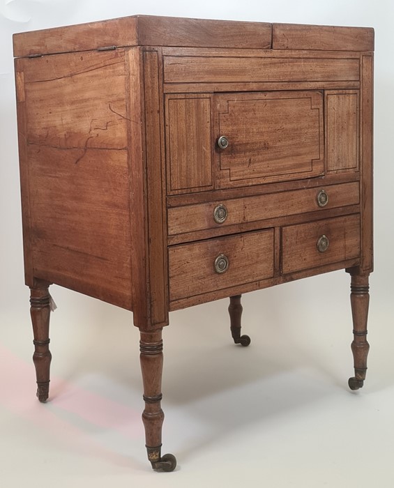 19th century mahogany folding washstand/dressing table, the rectangular top opening to reveal