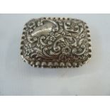 Early 20th century silver snuff box of rococo design, initialled AJ ,Chester 1900, E J Trevitt &