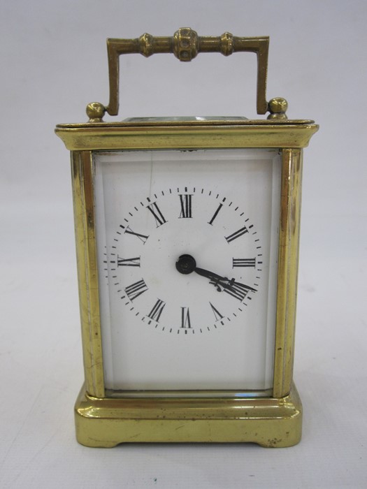 A French carriage clock, Roman numeral enamel dial, 10.5cm high not including handle