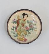 Japanese Satsuma pottery brooch, the circular plaque decorated with Geisha in garden, in metal mount