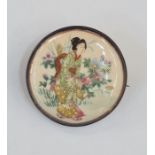 Japanese Satsuma pottery brooch, the circular plaque decorated with Geisha in garden, in metal mount