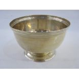 An early 20th century silver bowl, plain form with reeded rim on circular pedestal base, Sheffield