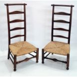 Pair of 20th century rush seated ladderback country prie-dieu chairs with low seats, on turned