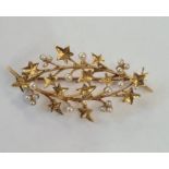 Gold-coloured metal and seedpearl ivy-pattern spray brooch