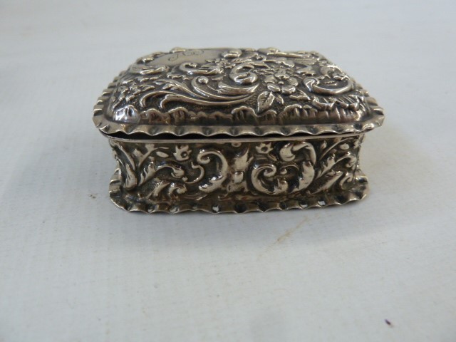Early 20th century silver snuff box of rococo design, initialled AJ ,Chester 1900, E J Trevitt & - Image 2 of 4