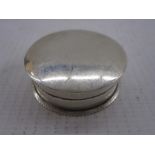 Edwardian silver pill box, circular with beaded edge, Birmingham 1901