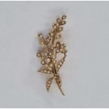 15ct gold and pearl spray brooch, floral spray pattern  Condition Report5.5 cms in length, .23