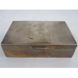 A 1950s silver mounted rectangular box, lined decoration to lid, London 1956, makers Garrard & Co