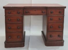 Victorian mahogany kneehole pedestal desk having shaped top with three frieze drawers, an