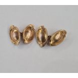 Pair of 10ct gold chain-pattern cufflinks each with oval scroll pattern ends, 7g approx and two tins