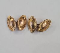 Pair of 10ct gold chain-pattern cufflinks each with oval scroll pattern ends, 7g approx and two tins