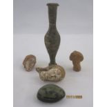 Three roman terracotta female heads, two with remnants of paint, a pottery unguent bottle, 14.5cm