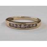 Gold and diamond half eternity ring, the seven diamonds channel set