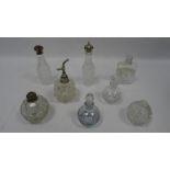 Collection of glass bottles, including silver topped example (Thomas Bradbury and sons,