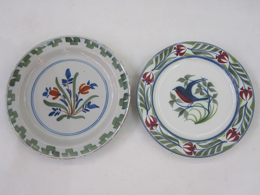 Delft plate, floral decorated with green rim, 22cms diam and a modern Delft plate with bird to