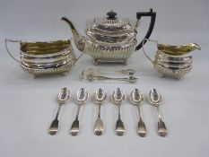George III silver three-piece tea service comprising teapot with ebony handle, 16cm high, milk