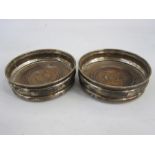 A pair of 20th century silver mounted and wooden wine coasters, circular, London, makers Nat Joseph,