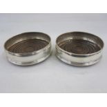 Pair of late 20th century silver-mounted and turned wood wine coasters, slightly bulbous, London,