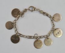 9ct gold shaped bar bracelet with gold disc charms, 23g approx