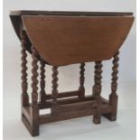 Antique oak gateleg dining table, oval, having single end drawer, on barleytwist turned supports