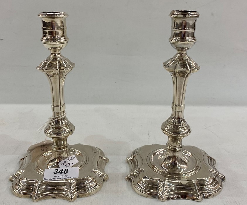 Pair of George II silver candlesticks, probably Irish by Charles Leslie of Dublin (maker's mark