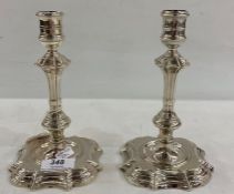 Pair of George II silver candlesticks, probably Irish by Charles Leslie of Dublin (maker's mark