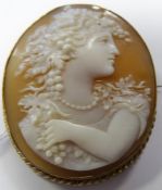 19th century carved shell cameo brooch with head and shoulders profile portrait of a Bacchanalian