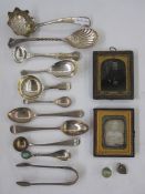 An early 19th Century silver caddy spoon, initialled to handle G.R.B, London 1815, makers mark worn,